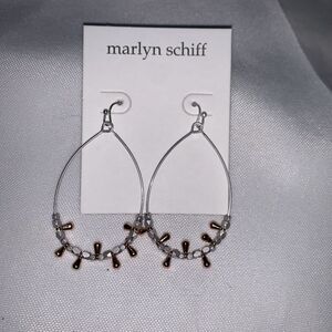 Marlyn Schiff Mareka Earrings teardrop-shaped silver pieces with a hook closure